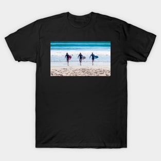 Three surfers. T-Shirt